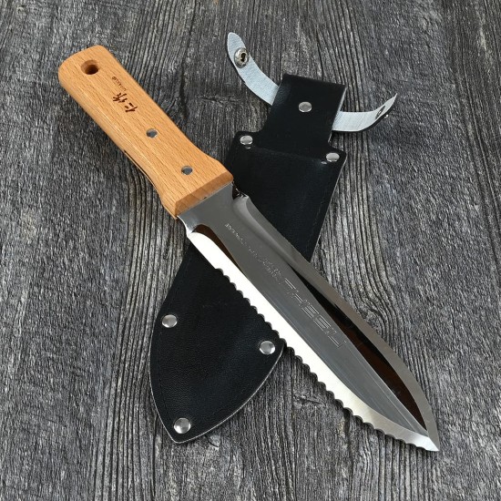 A hori hori knife. One of the best 5 tools that makes garden maintenance a breeze. It is great when digging out deep-rooted weeds in tight spaces